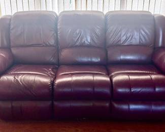 Brown leather and studded sofa