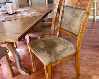 Smooth wood dining table with 6 chairs