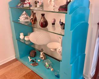 Display items and 3 tier blue display shelf