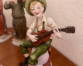 Guitar boy decorative figure
