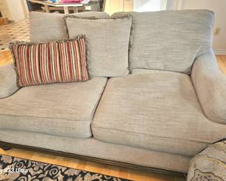 Comfortable loveseat, grayish color