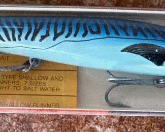 Fly fishing equipment: tackle box, poles, Frabill net, woven creel basket, Cabela’s vest, waders
