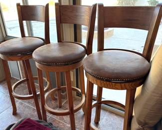 Leather swivel bar chairs