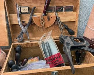 Leather tooling supplies, including vintage hand tools