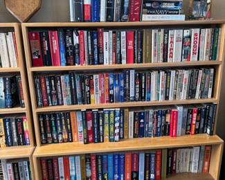 Novels: Lee Child, John Sanford, Louis L’amour, Tony + Anne Hillerman, David Balducci; handmade bookcases