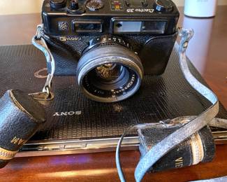 YASHICA 35 ELECTRO FIRST RANGEFINDER CAMERA AND BELONGED TO A VIETNAM WAR CORRESPONDANT AND WAS USED IN THE WAR.
