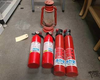 2534  4 Fire Extinguishers and 1 Winged Wheel No