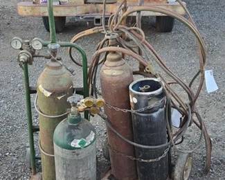 #80412 • (4) Metal Tanks, Gauges, Welding Wire, Hoses & Dolly
