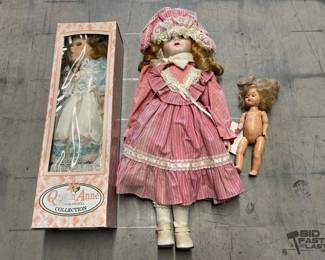4528  2 Porcelain Dolls and 1 Plastic Doll