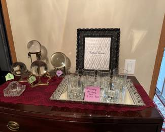 Beautiful solid glass globes on solid brass stands. Givenchy whiskey set!