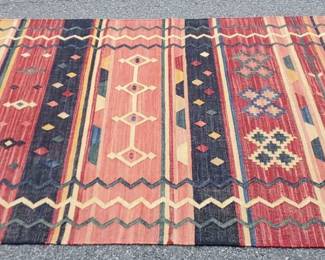 Area Rug in Blue, Red, Cream and Pale Yellow