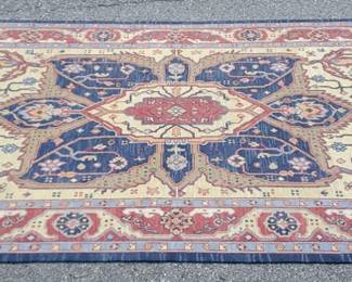 Red Area Rug Accented in Blues