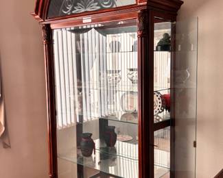 Howard Miller tall curio cabinet with 4 glass shelves (opens on either side)