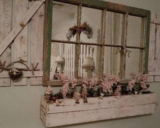 This is a cool Farmhouse look screwed to the wall...  We can help get it down.