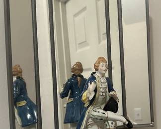 Mirrored Sconce with Figurine