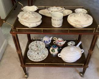 Various China pieces on Roller cart