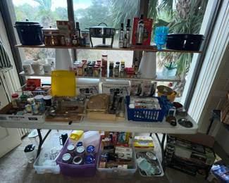 Another table full of cooking pots, spices, chafing dishes & supplies. These folks loved to cook!