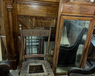 BEHIND THIS IS A WONDERFUL ANTIQUE OAK FIREPLACE MANTLE