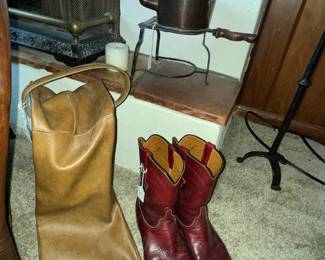 Amazing leather boot-bag and leather boots. And some wonderful wrought iron collectables around the fireplace!