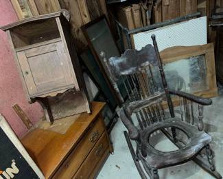 Antique rocker and antique wall cabinet