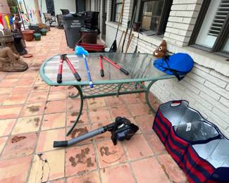 Oblong glass-top patio table