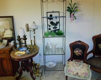 cut crystal and glassware. metal display stand/shelving with glass tops, again tons of lamps and fireplace accessories.