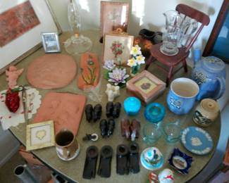 handcarved african candlestick pairs. british/english china. ceramic wallhangings, etc.