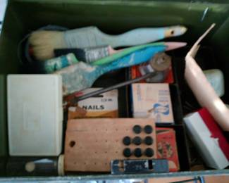assorted art supplies and home improvement tools.