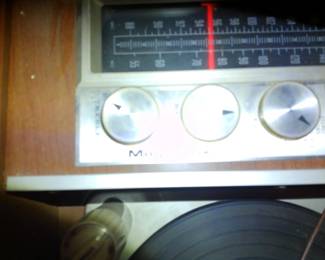 magnavox mcm console stereo. fully functioning, could use some deoxit sprayed on the potentiometer for volume, as it scratches slightly when adjusting, but once the volume is set the scratchiness stops. will include modern needle and has stock record dusting kit. pretty heavy, but i can help load it into your large suv, wagon or pickup truck.