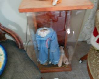 doll with display case