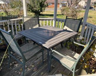 Another patio table and 4 chairs 
