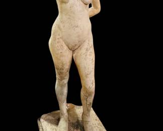 Cement statue of woman