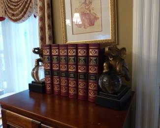 Elephant bookends, leather bound books