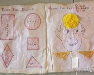 Hand sewn and drawn cloth childs book
