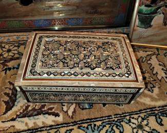 Several mother of pearl boxes