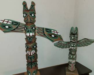 Hand carved table top size totem poles