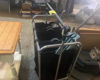 ROLLING CLOTHING DIVIDED HAMPER WITH CLOTHES BAR