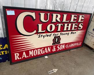 VINTAGE WOOD FRAMED CURLEE CLOTHES METAL SIGN