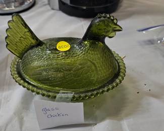 GREEN HEN ON NEST