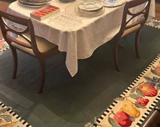Large rug and dining room table