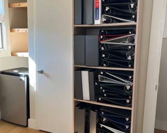 Tall shelf (binders are not for sale)