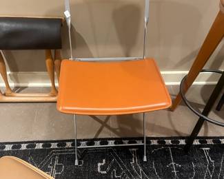 $160. DWR "Lina" leather folding chair. 17.25 "w x 18"d x 32"h. Seat height is 17". Available during online shopping starting at 6pm on Wednesday per the instructions in the sale description.