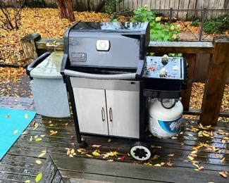 $40 Weber Genesis Silver BBQ with two tanks. For sale during in-person shopping hours Friday and Saturday.
