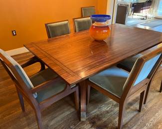 $1200. New Creations dining table 72"w x 24"d x 30"h. Two 12" leaves. Beautiful inlaid detailing. Leaves fit on each end. Available during online shopping starting at 6pm on Wednesday per the instructions in the sale description.