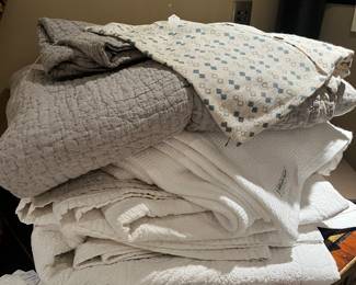 Bedding for sale during in-person shopping hours Friday and Saturday.