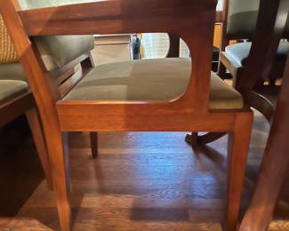 Side view of the arms on the dining chairs - two have arms.