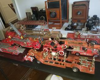 Collection of Antique Iron and Tin Firetrucks, and Antique Cameras