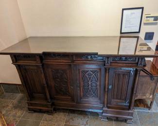 Amazing Gothic sideboard with glass top. Incredible.
