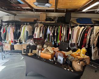 Designer clothing ranging from Small - Large. Mostly women’s, some men’s. 