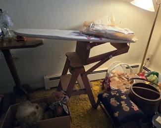 Fold up ironing board, turns into a step stool